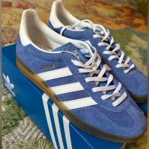 Size 8.5W blue gum sole Adidas Gazelle never worn. Comes with box/laces.